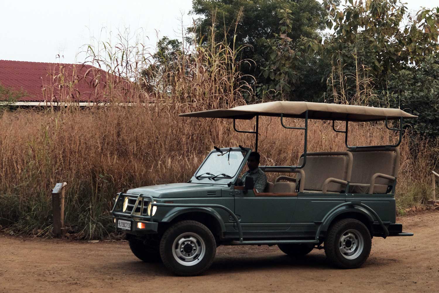 A single safari jeep alone on a forest track at Tipeshwar Wildlife Sanctuary, illustrating low safari vehicle density